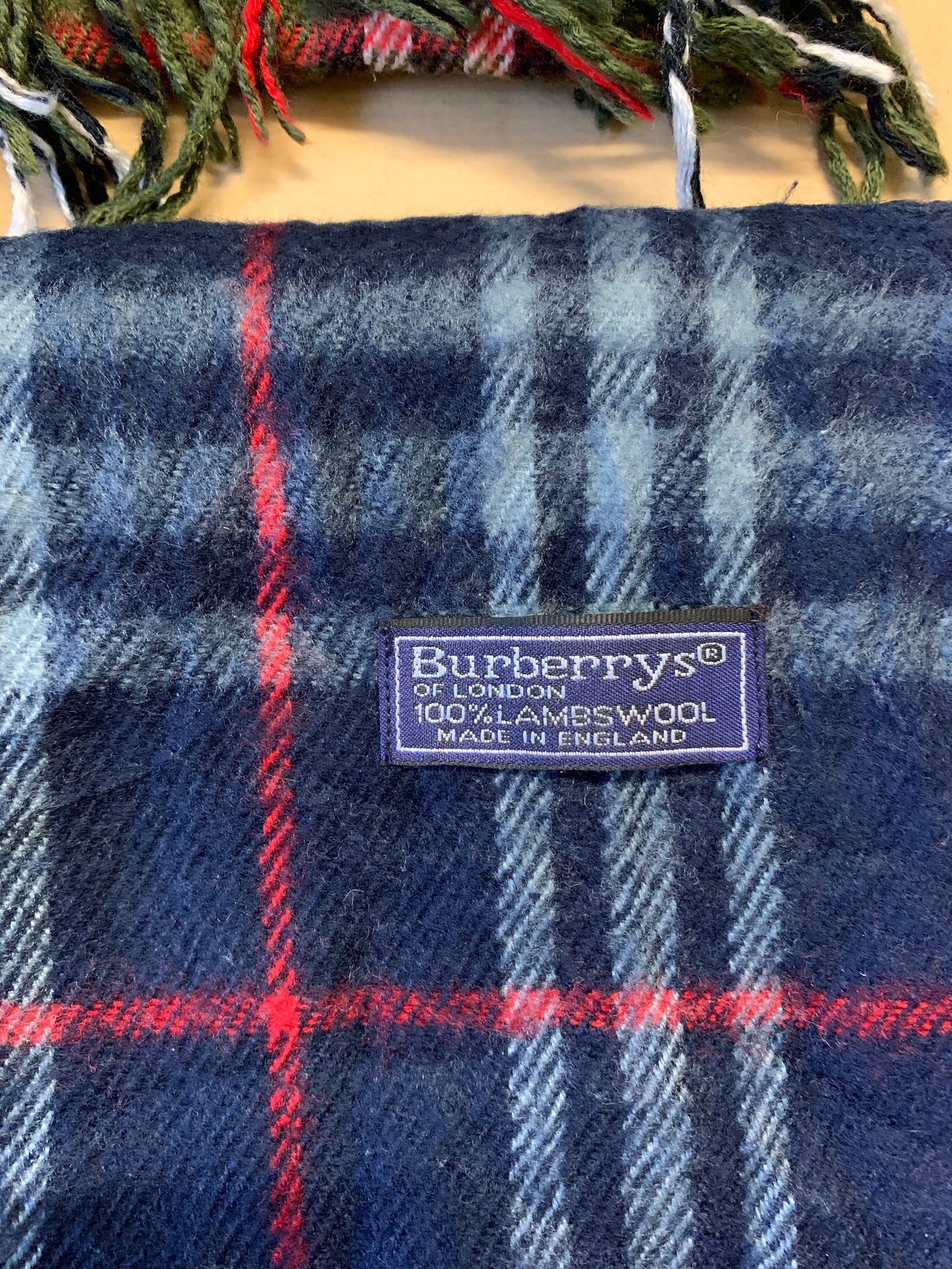 2x Burberry of London 100% lambswool navy and beige scarfs.